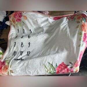 Baby Girl Milestones Month blanket with floral markers